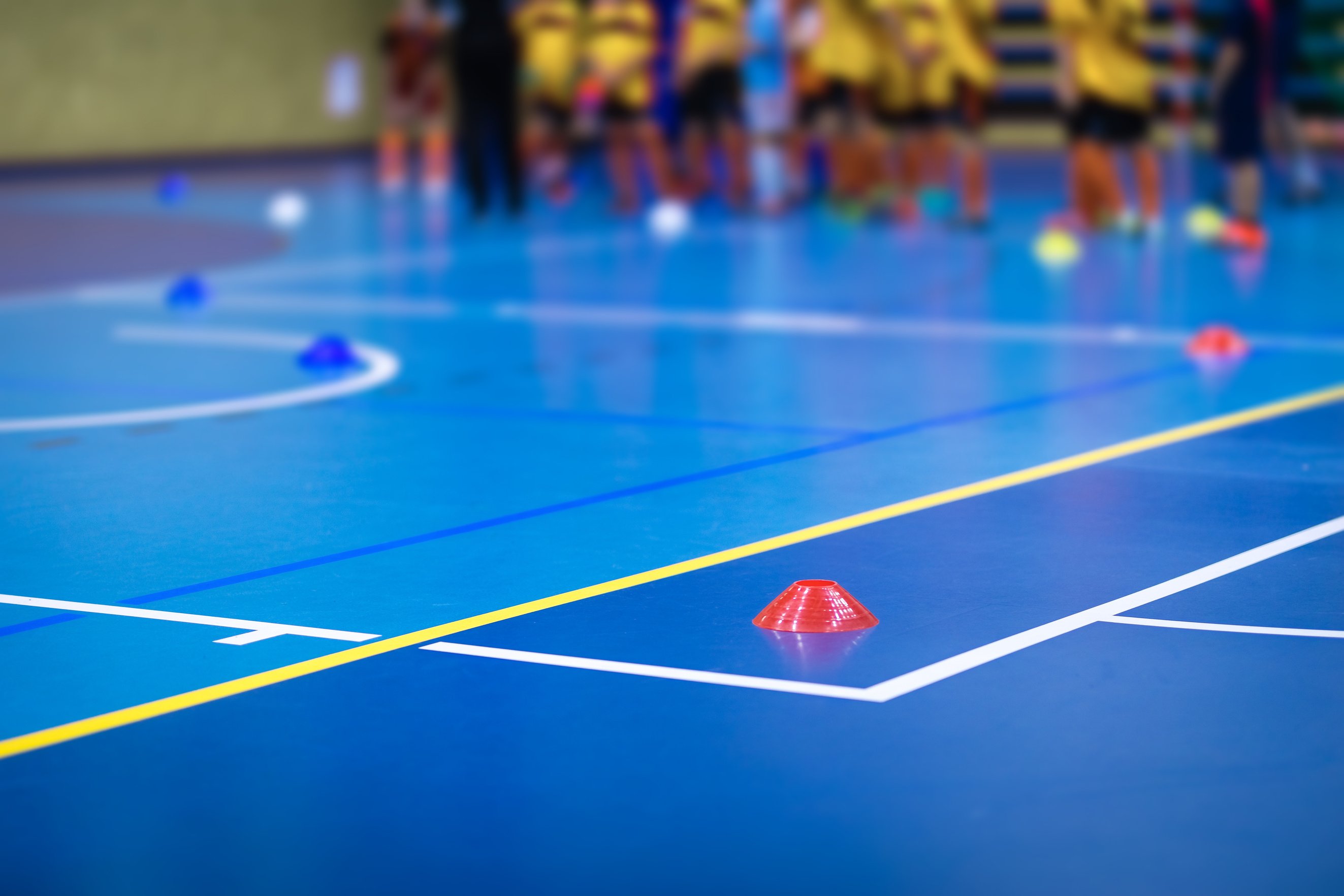 Sports Team on Futsal Training Field. Indoor Soccer Training Dur